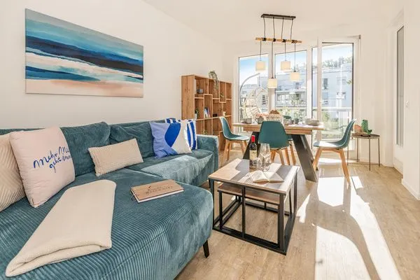 Wohnzimmer  Ferienwohnung Haff & Herz mit Balkon, Freizeit- und Kinderspielbereich