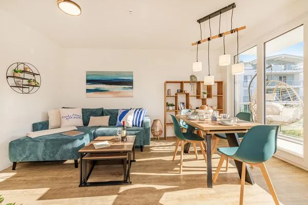 Wohnzimmer  Ferienwohnung Haff & Herz mit Balkon, Freizeit- und Kinderspielbereich
