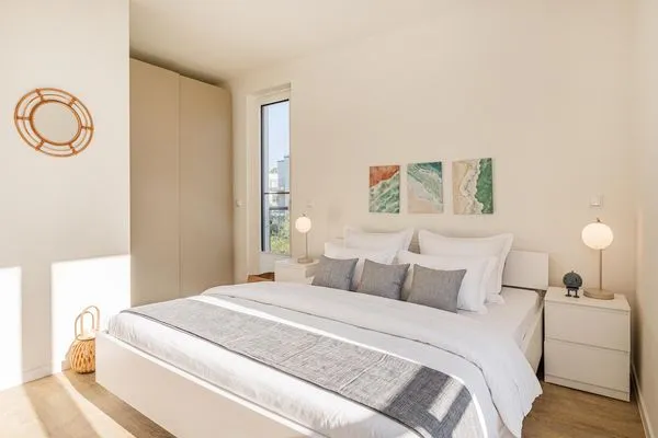 Schlafzimmer  Ferienwohnung Haff & Herz mit Balkon, Freizeit- und Kinderspielbereich