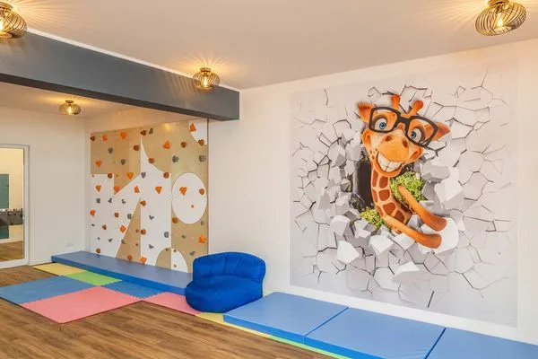 Spielanlage  Ferienwohnung Haff & Herz mit Balkon, Freizeit- und Kinderspielbereich
