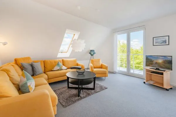 Wohnzimmer  Ferienwohnung Thusnelda mit Balkon und nur 500 m zum Strand