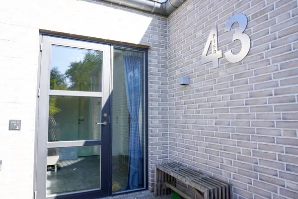 Fassade / Eingang  (ERL43) Ferienhaus PIER 43