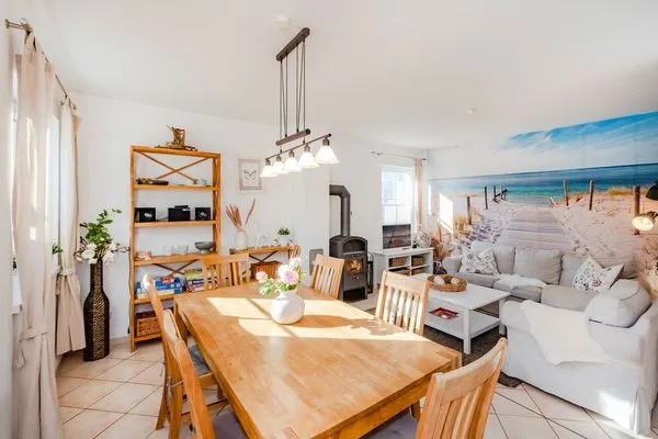 Wohnzimmer  Ferienhaus Golfblick mit Sonnenterrasse und Kamin