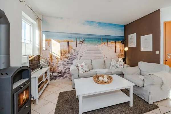 Wohnzimmer  Ferienhaus Golfblick mit Sonnenterrasse und Kamin