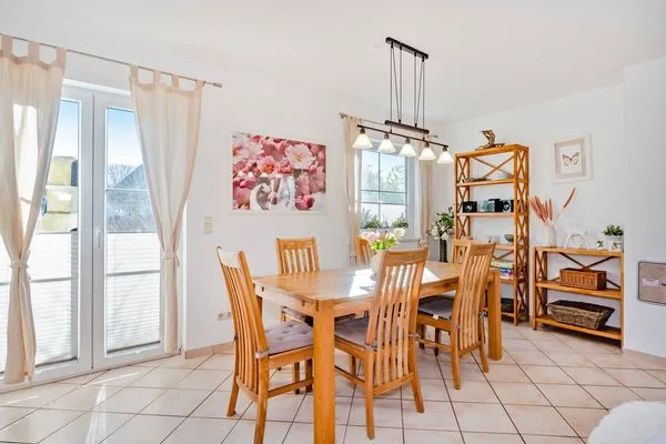 Wohnzimmer  Ferienhaus Golfblick mit Sonnenterrasse und Kamin