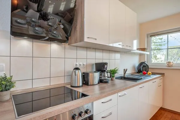 Küche / Küchenzeile  Ferienwohnung Strandbrise mit Kamin und Balkon