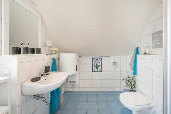 Badezimmer  Ferienwohnung Strandbrise mit Kamin und Balkon