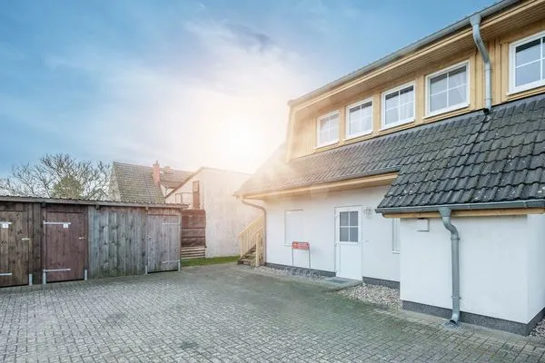 Fassade / Eingang  Ferienwohnung Strandbrise mit Kamin und Balkon
