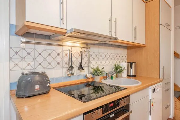 Küche / Küchenzeile  Ferienhaus Rad Kapitän direkt am See mit Sauna und Terrasse