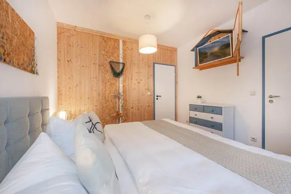 Schlafzimmer  Ferienhaus Rad Kapitän direkt am See mit Sauna und Terrasse