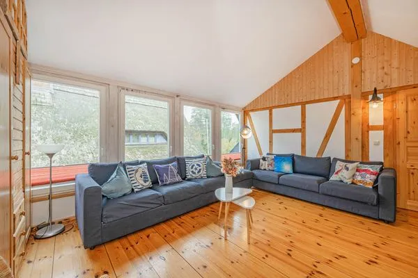 Wohnzimmer  Ferienhaus Rad Kapitän direkt am See mit Sauna und Terrasse