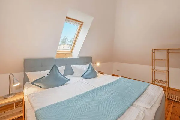 Schlafzimmer  Ferienhaus Rad Kapitän direkt am See mit Sauna und Terrasse