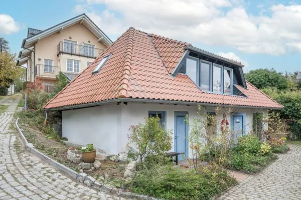 Fassade / Eingang  Ferienhaus Rad Kapitän direkt am See mit Sauna und Terrasse