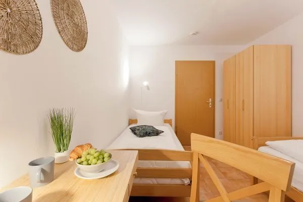 Schlafzimmer  Ferienwohnung Auszeit nur 100 m zum Strand mit Balkon
