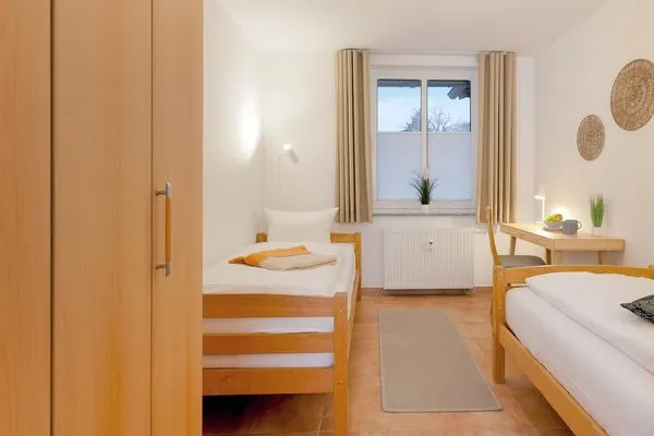 Schlafzimmer  Ferienwohnung Auszeit nur 100 m zum Strand mit Balkon