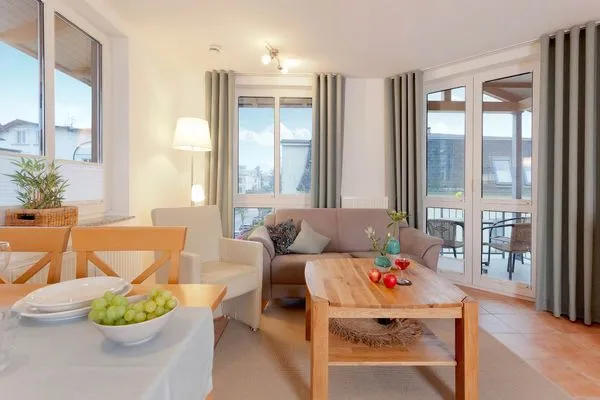 Wohnzimmer  Ferienwohnung Auszeit nur 100 m zum Strand mit Balkon