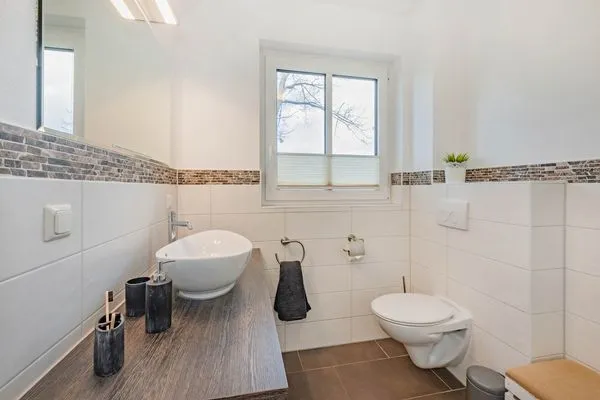 Badezimmer  Ferienhaus Anemone mit Kamin und großer Sonnenterrasse