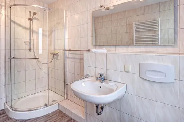 Badezimmer  Ferienwohnung Meereswoge mit Balkon und nur 100 m bis zum Strand