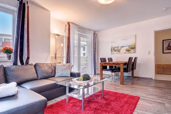 Wohnzimmer  Ferienwohnung Meereswoge mit Balkon und nur 100 m bis zum Strand