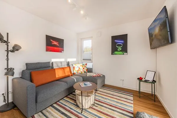 Wohnzimmer  Ferienwohnung Ostseebude mit Balkon und nur 800 m zum Strand
