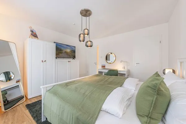 Schlafzimmer  Ferienwohnung Ostseebude mit Balkon und nur 800 m zum Strand