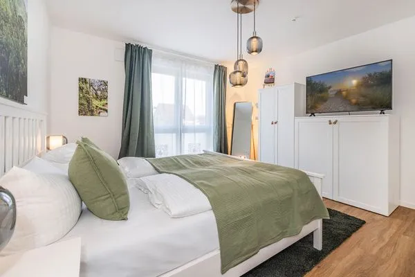 Schlafzimmer  Ferienwohnung Ostseebude mit Balkon und nur 800 m zum Strand