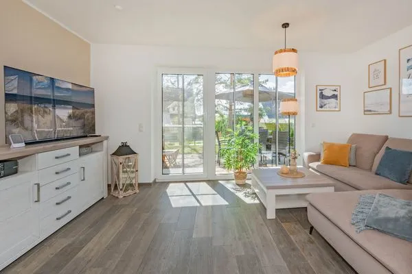 Wohnzimmer  Ferienhaus MeerSeenSucht mit Sauna, Terrasse und Grill