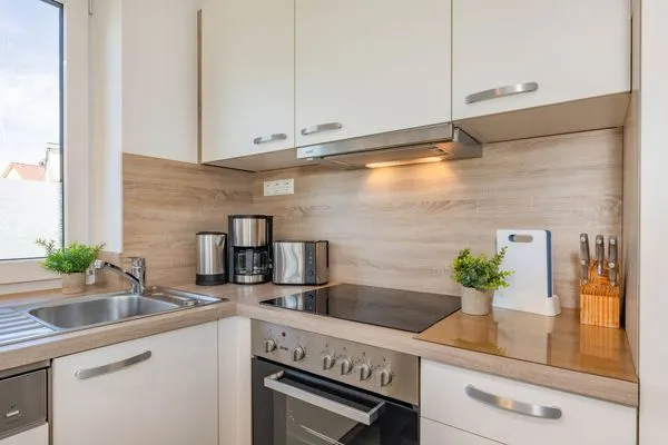 Küche / Küchenzeile  Ferienhaus MeerSeenSucht mit Sauna, Terrasse und Grill