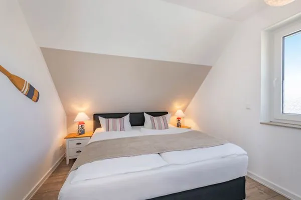 Schlafzimmer  Ferienhaus MeerSeenSucht mit Sauna, Terrasse und Grill