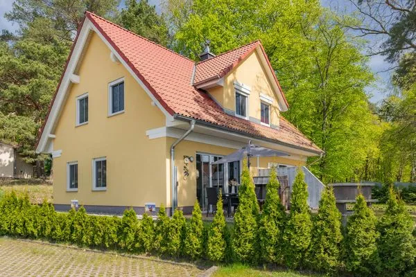 Fassade / Eingang  Ferienhaus MeerSeenSucht mit Sauna, Terrasse und Grill