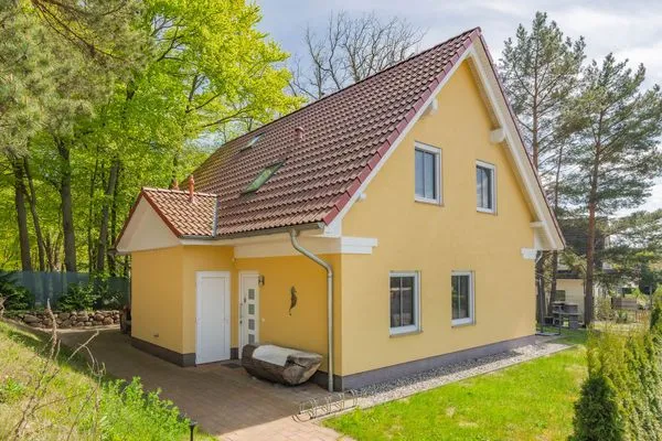 Fassade / Eingang  Ferienhaus MeerSeenSucht mit Sauna, Terrasse und Grill