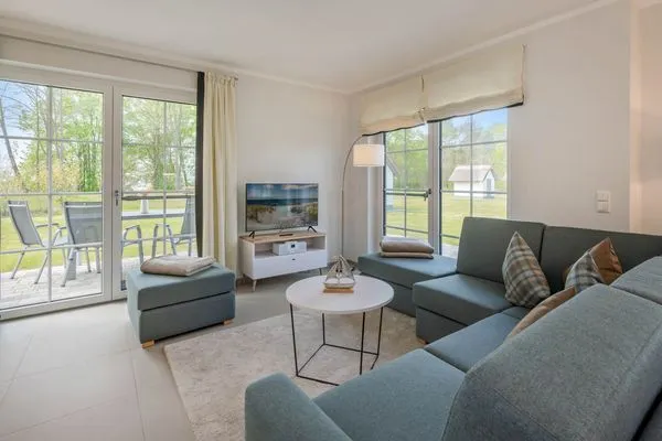 Wohnzimmer  Ferienhaus Stettiner Haffblick mit Sauna, Kamin und Terrasse