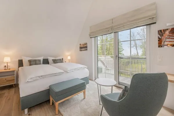 Schlafzimmer  Ferienhaus Stettiner Haffblick mit Sauna, Kamin und Terrasse