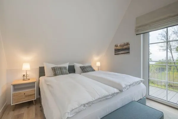 Schlafzimmer  Ferienhaus Stettiner Haffblick mit Sauna, Kamin und Terrasse