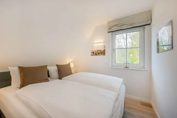 Schlafzimmer  Ferienhaus Stettiner Haffblick mit Sauna, Kamin und Terrasse