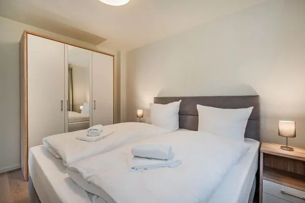 Schlafzimmer  Ferienhaus Im Kiefernwäldchen mit Sauna, Kamin und Terrasse