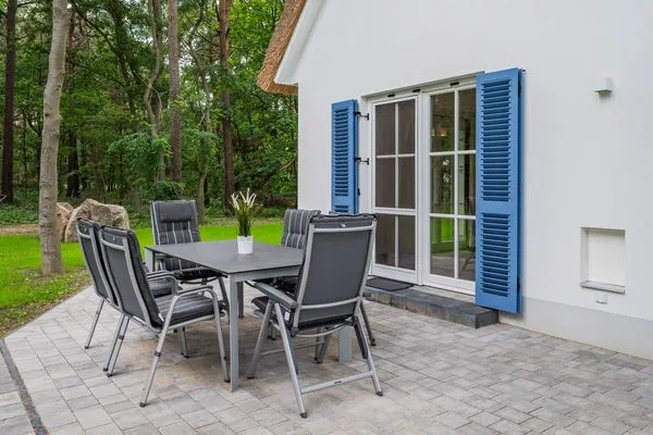 Terrasse  Ferienhaus Im Kiefernwäldchen mit Sauna, Kamin und Terrasse