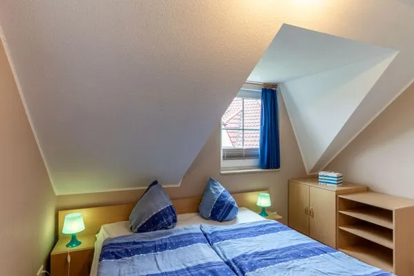 Schlafzimmer mit Doppelbett Am Deich Am Deich Haus 32