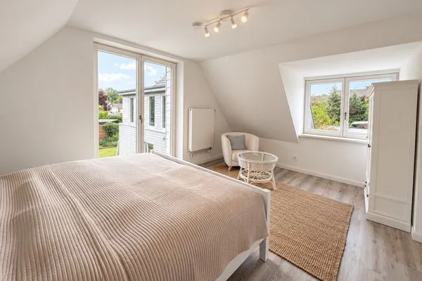 Schlafzimmer Haffperle Küstenperle - zentral in Haffkrug, nur wenige Schritte zum Strand