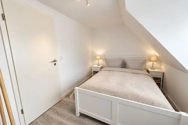 Schlafzimmer Haffperle Küstenperle - zentral in Haffkrug, nur wenige Schritte zum Strand