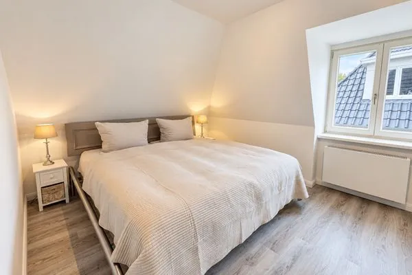 Schlafzimmer Haffperle Küstenperle - zentral in Haffkrug, nur wenige Schritte zum Strand