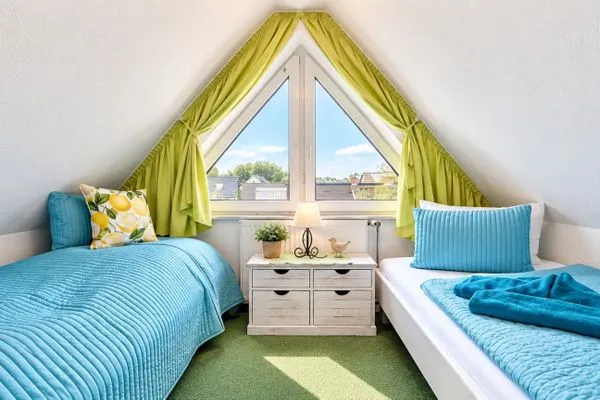 Schlafzimmer mit zwei Einzelbetten  Ferienwohnung Jonathan