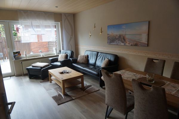  Ferienhaus MeerLiebe Dornumersiel - Wohnzimmer