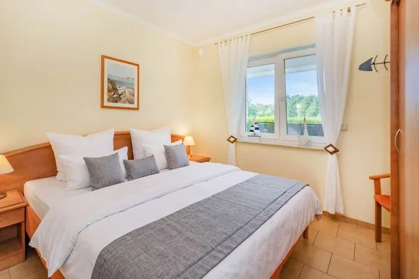 Schlafzimmer  Ferienhaus Neptun