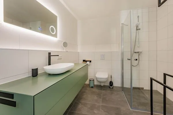 Badezimmer  Ferienwohnung Goldfisch mit Balkon, Wellness- und Kinderspielbereich