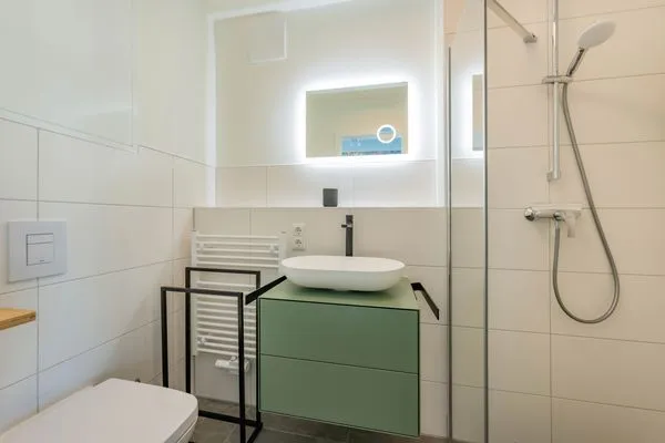 Badezimmer  Ferienwohnung Goldfisch mit Balkon, Wellness- und Kinderspielbereich