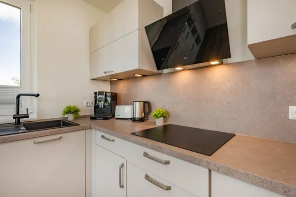 Küche / Küchenzeile  Ferienwohnung Goldfisch mit Balkon, Wellness- und Kinderspielbereich