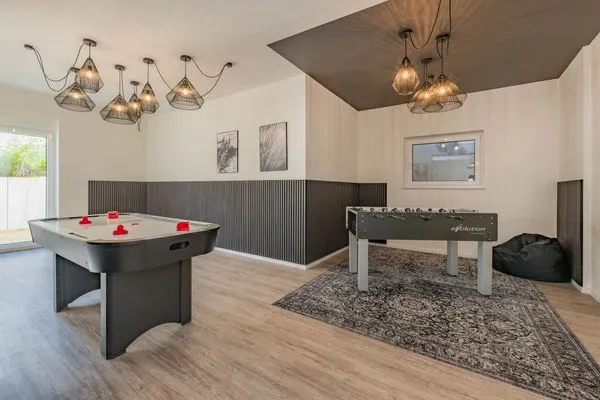 Spielanlage  Ferienwohnung Goldfisch mit Balkon, Wellness- und Kinderspielbereich