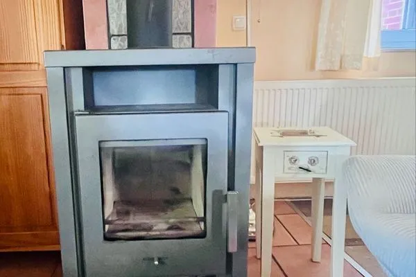 Kamin-/Ofen  Haus Strandkorb