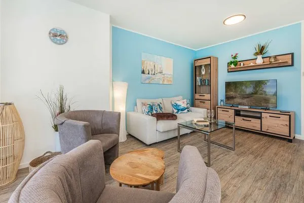Wohnzimmer  Ferienwohnung Klippenblick mit Sauna, Kinderspielbereich und Fitnessraum